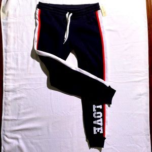 NWT! Women’s Black/white/orange Joggers + “LOVE” emblem by Bobbie Brooks Size M